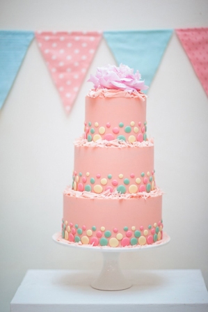 Pink cake with pastel accents